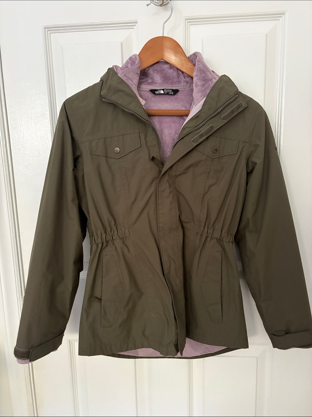 Girl’s Olive Green Hooded Jacket with Lavender Lining which zips out.